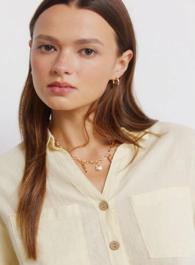 Springfield  Linen shirt. Short folded sleeve. V-neck shirt collar. Front buttons. Patch pockets. for Women | Best Price UAE