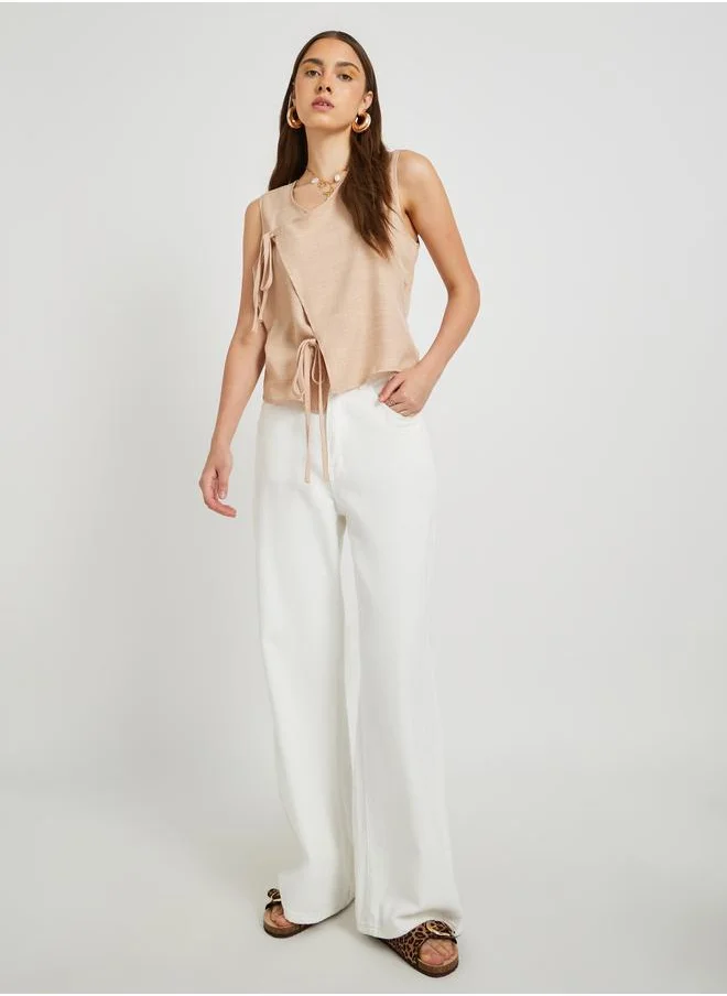 Take Two Take Two Solid Sleeveless Wrap Top with Tie-Up Detail