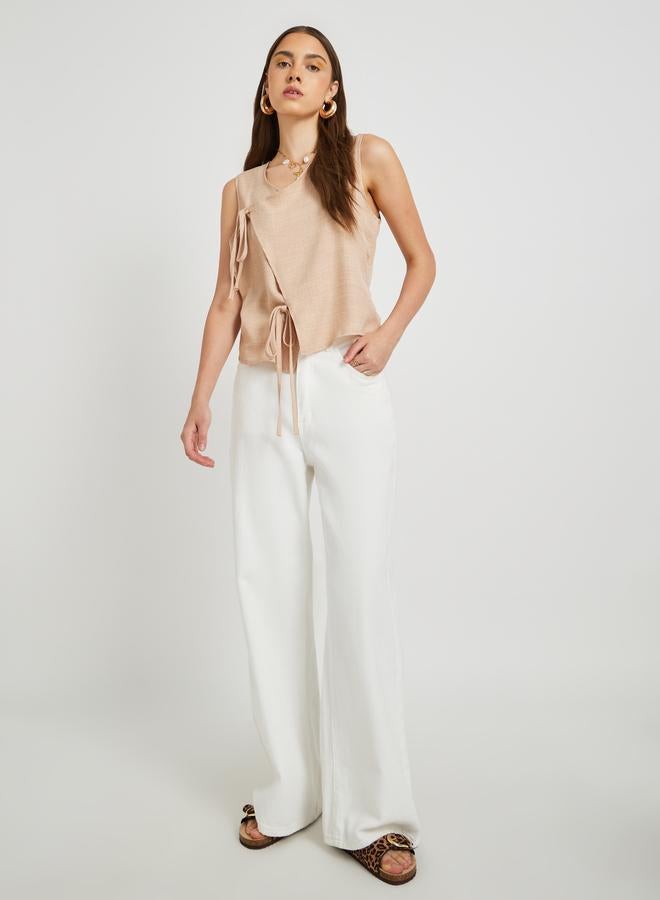 Take Two Solid Sleeveless Wrap Top with Tie-Up Detail - Image 2
