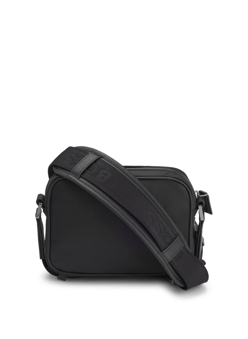 بوس Crossbody bag with monogram pattern