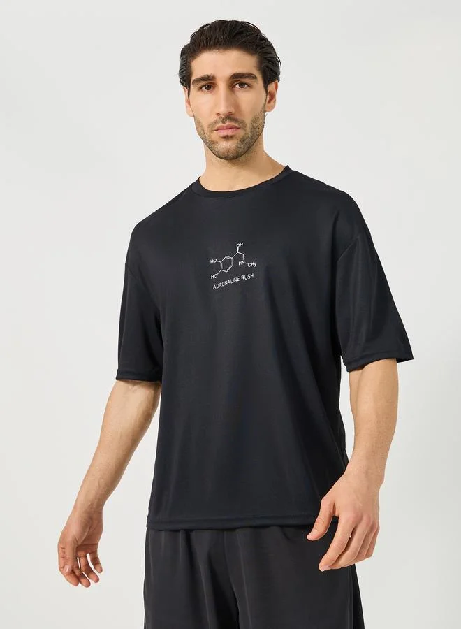 Styli Active Oversized Slogan Print Round Neck T-Shirt and Shorts Set