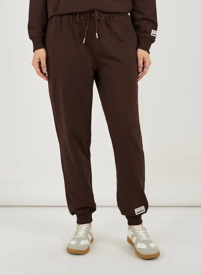 Styli Styli Graphic Print Oversized Hoodie and Cuffed Joggers Co-Ords