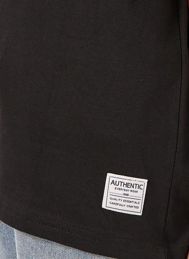 Styli Solid Oversized T-Shirt with Badge Detail