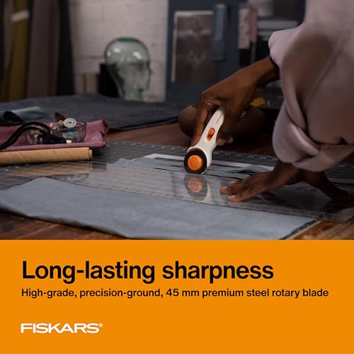 Fiskars 45mm Rotary Cutter for Fabric, Premium Steel Stick Fabric Cutter Cuts Through Multiple Layers, Right and Left Handed, Easy and Safe Blade Change, Arts and Crafts, Sewing and Quilting Tools - Image 5