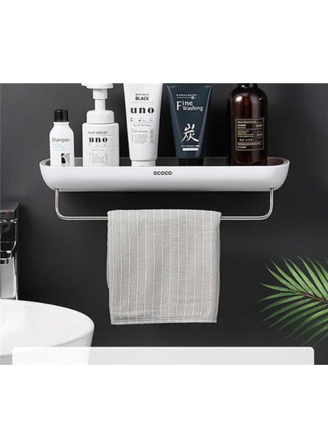 ناما رف حمام مثبت على الحائط عملي وأنيق مع حامل مناشف مدمج. الرف مصنوع من البلاستيك المتين ويوفر مساحة مناسبة لتخزين أدوات النظافة مثل زجاجات الشامبو، غسول الوجه، ومرطبات البشرة. أسفل الرف، يوجد قضيب معدني قوي مثالي لتعليق منشفة يد أو منشفة وجه، مما يجعلها في متناول اليد. - Image 3
