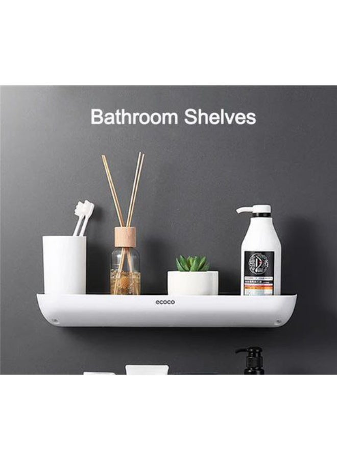 ناما رف حمام مثبت على الحائط عملي وأنيق مع حامل مناشف مدمج. الرف مصنوع من البلاستيك المتين ويوفر مساحة مناسبة لتخزين أدوات النظافة مثل زجاجات الشامبو، غسول الوجه، ومرطبات البشرة. أسفل الرف، يوجد قضيب معدني قوي مثالي لتعليق منشفة يد أو منشفة وجه، مما يجعلها في متناول اليد. - Image 2