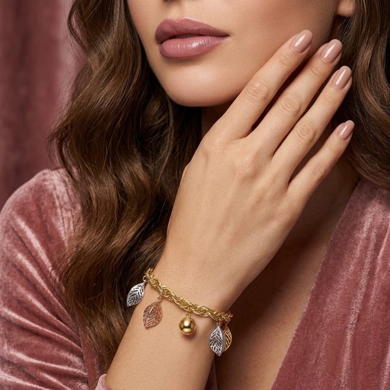 An elegant gold bracelet, with a braided chain and leaf pendants in (silver, rose gold, gold) colors and a shiny gold-colored ball in the middle, with an adjustable clasp to suit you. - Image 2