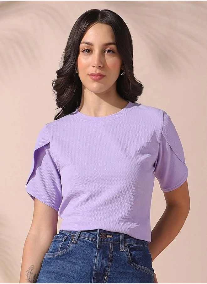 دينيس لينغو Women lavender regular fit textured half sleeves t-shirt 100% poly top with pull over closure- a fresh take on timeless style.