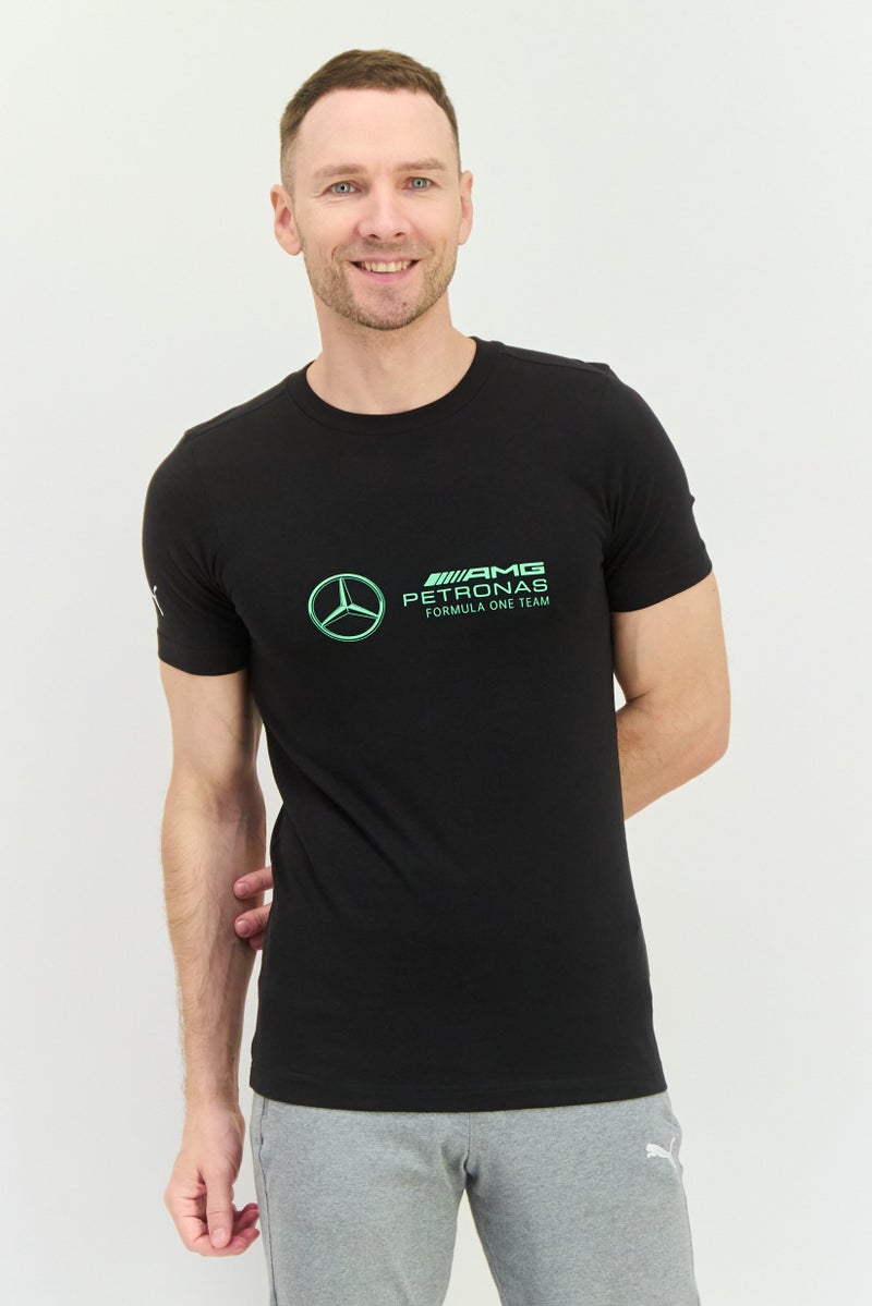 PUMA Men AMG Petronas Sportswear Fit Short Sleeves Outdoor T-shirt, Black  - Image 1