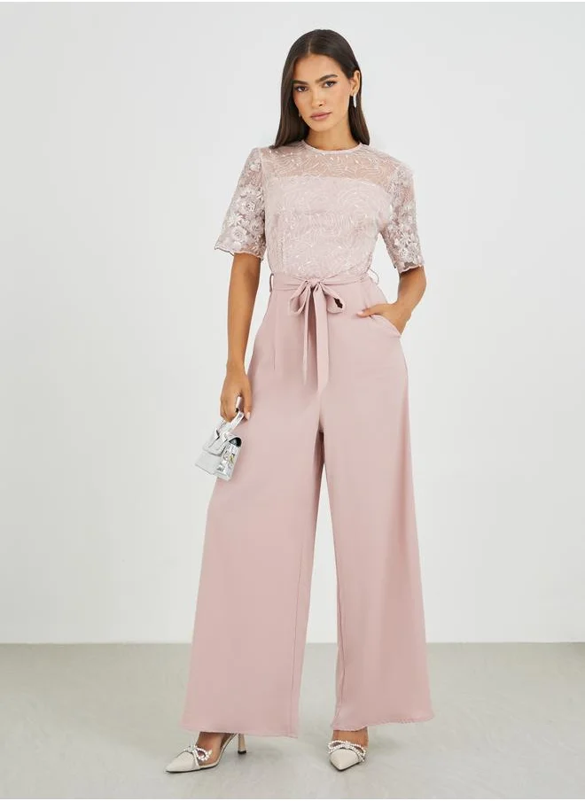 ستايلي Styli Lace Insert Waist Tie-Up Wide Leg Jumpsuit