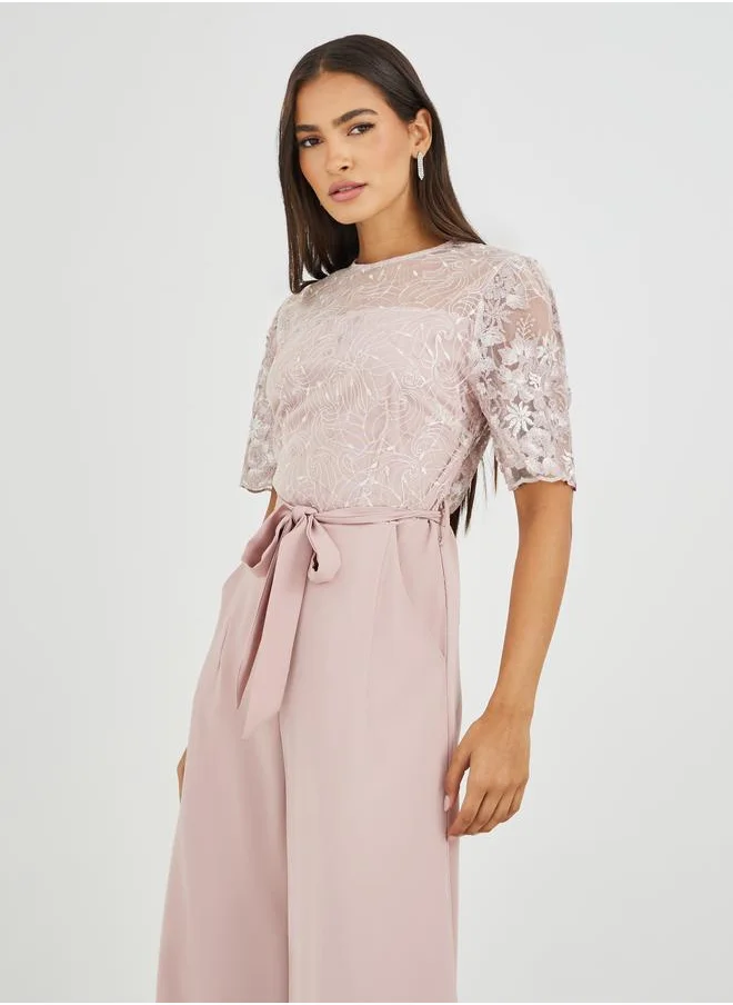 ستايلي Styli Lace Insert Waist Tie-Up Wide Leg Jumpsuit