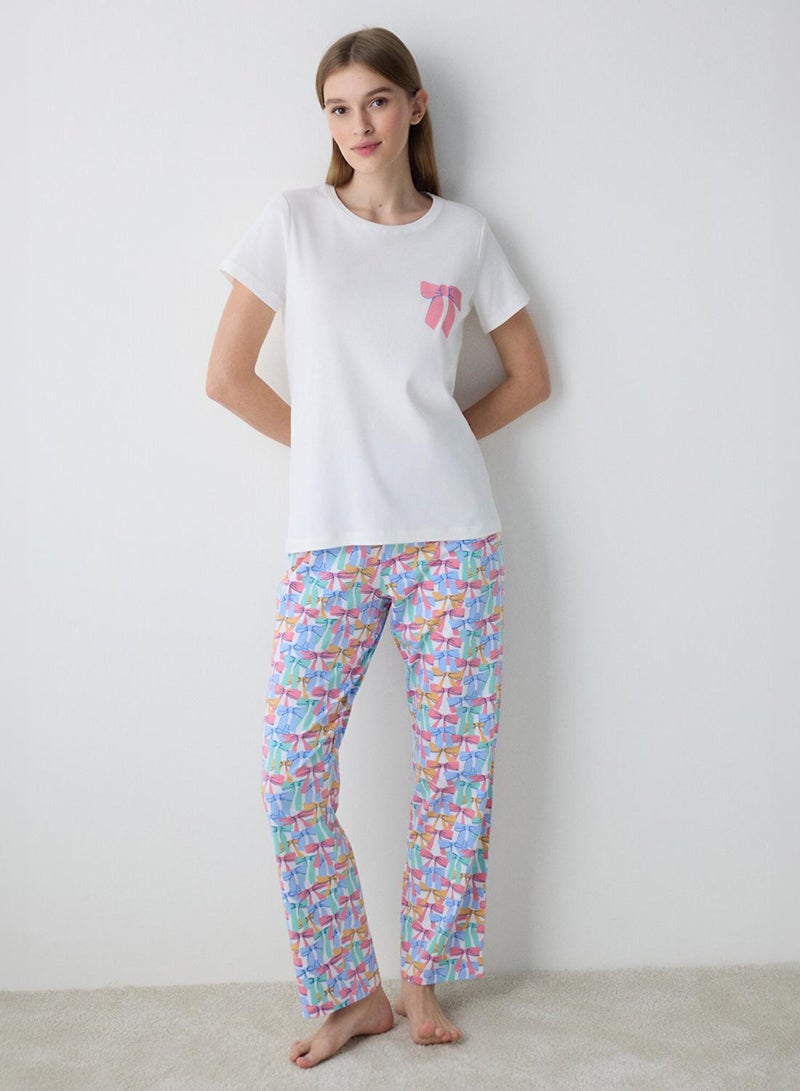 بنتي طقم بيجامة بفيونكات ملونة - Image 1