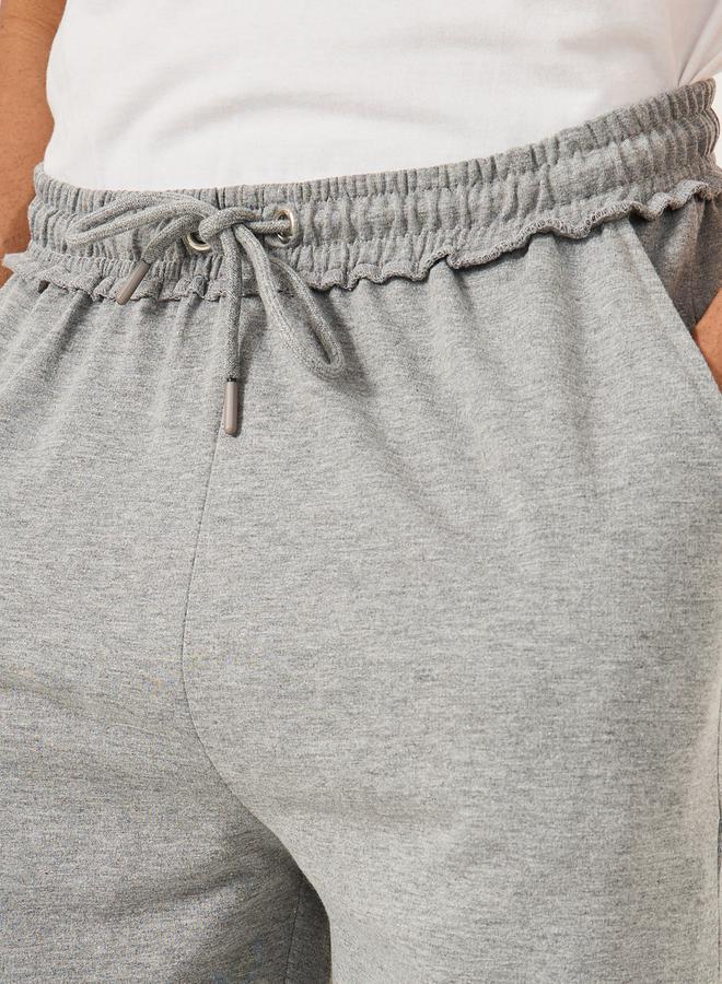 ستايلي شورت واسع بخصر متوسط وحبل شد - Image 3