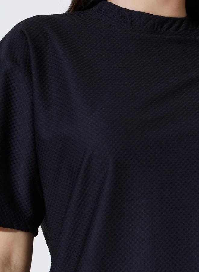 Styli  Black Oversized Textured Round Neck T-Shirt for Women | Best Price UAE