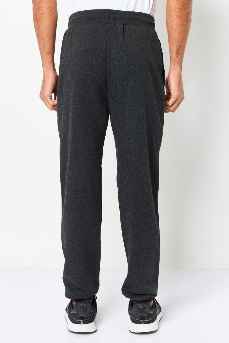 Reebok Men Sportswear Fit Brand Logo Outdoor Sweatpants, Black - Image 3