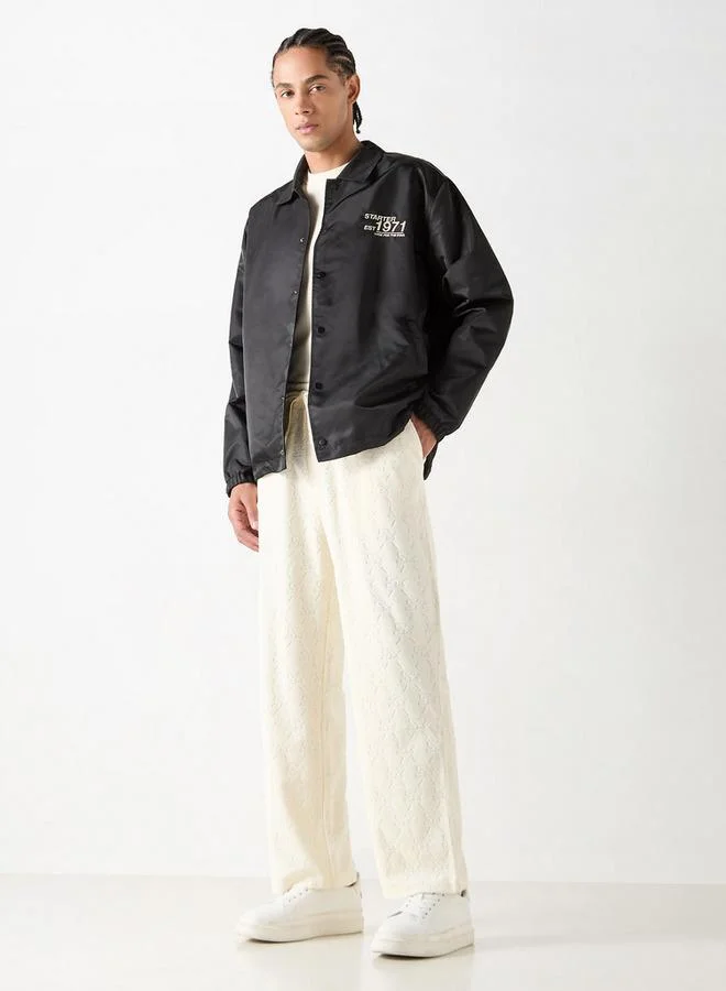 ستارتر جاكيت راكبي الدراجات النارية بياقة وشعار وأكمام طويلة وجيوب من ستارتر