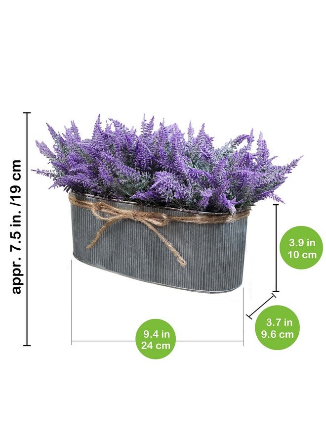 وينلين تنسيق زهور اللافندر الصناعية من وينلين، مقاس 10 بوصات، في صندوق زرع معدني بيضاوي الشكل مجلفن، نباتات لافندر صناعية مزروعة في أصص، مناسبة لطاولة الربيع في المزرعة، أو كقطعة مركزية لحفلات الزفاف أو المكتب أو المطبخ. - Image 3