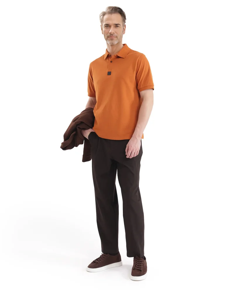 Rare Rabbit Men's Silicon Badge Branded Solid Polo