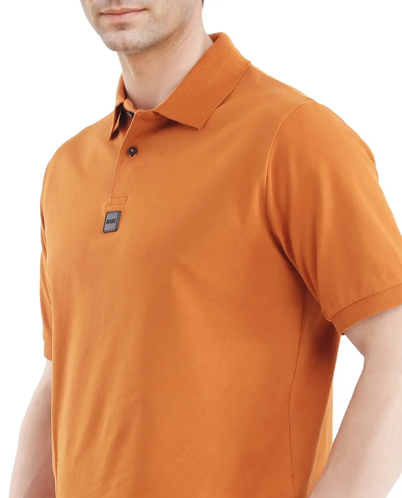 Rare Rabbit Men's Silicon Badge Branded Solid Polo