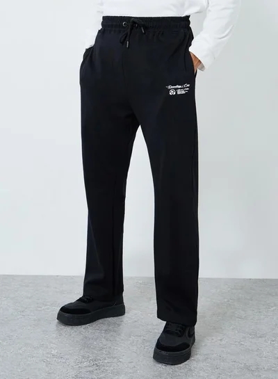 ستايلي بنطال جوغرز فضفاض بطبعة كتابة