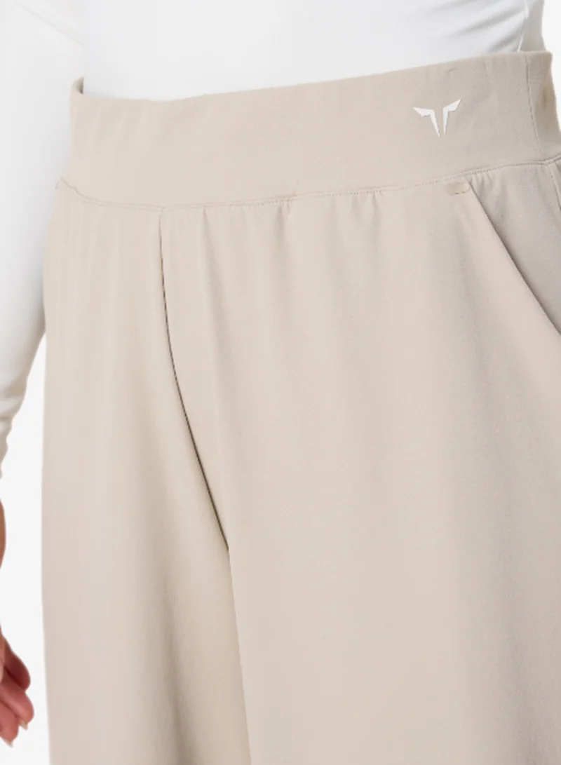 Squatwolf PLAZA TAUPE Woven Stretch Joggers for Women | Best Price UAE