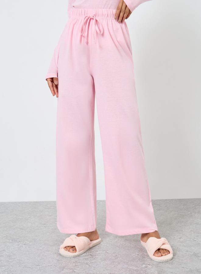 ستايلي طقم بيجامة تيشيرت قطن بأزرار أمامية وبنطال بأرجل واسعة - Image 4