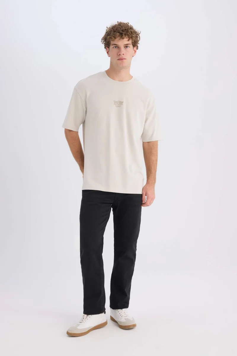 ديفاكتو Boxy Fit Crew Neck Printed Short Sleeve T-Shirt