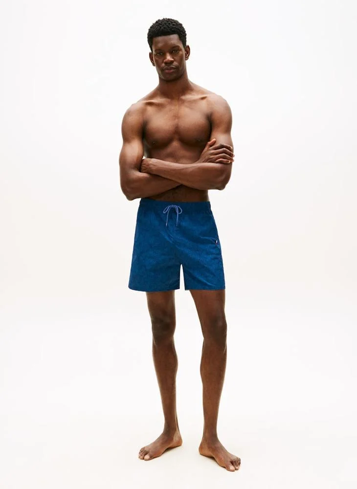 Tommy Hilfiger Palm Leaf Aegean Sea Original Print Mid Length Swim Shorts for Men | Best Price UAE