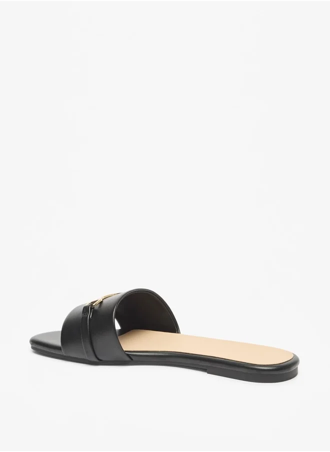 فلورا بيلا من شو إكسبرس Women's Solid Slip-On Sandals with Metal Accent