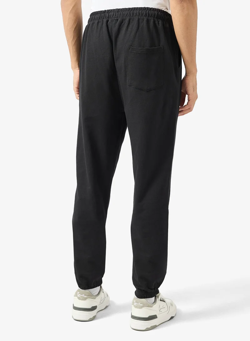 سفنتي فايف بنطلون رياضي فضفاض بطبعة نصية