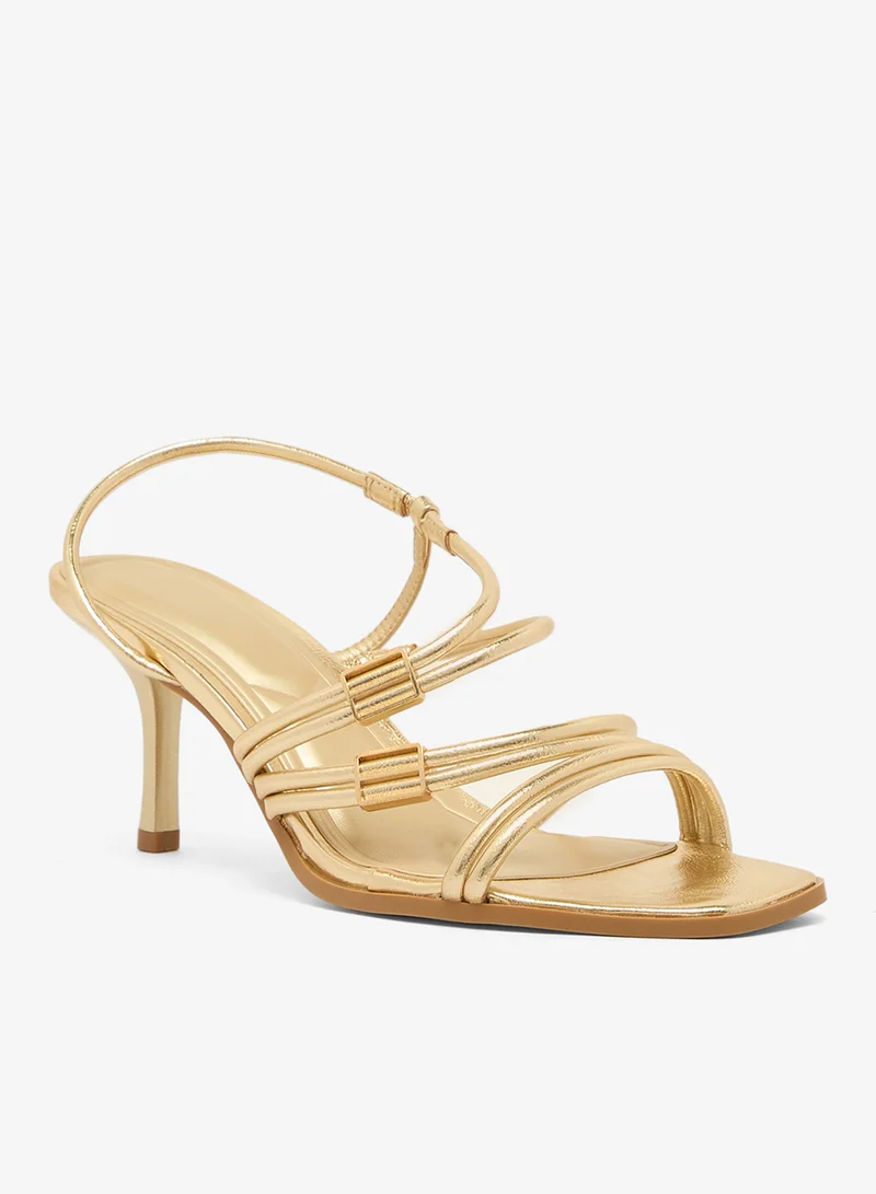 ترافل من نمشي صنادل بكعب متوسط وتفاصيل أشرطة ذهبية