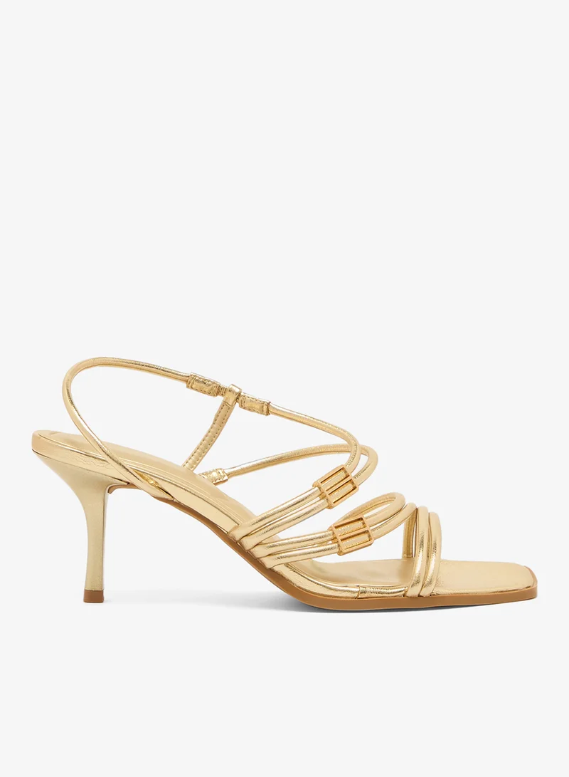 ترافل من نمشي صنادل بكعب متوسط وتفاصيل أشرطة ذهبية