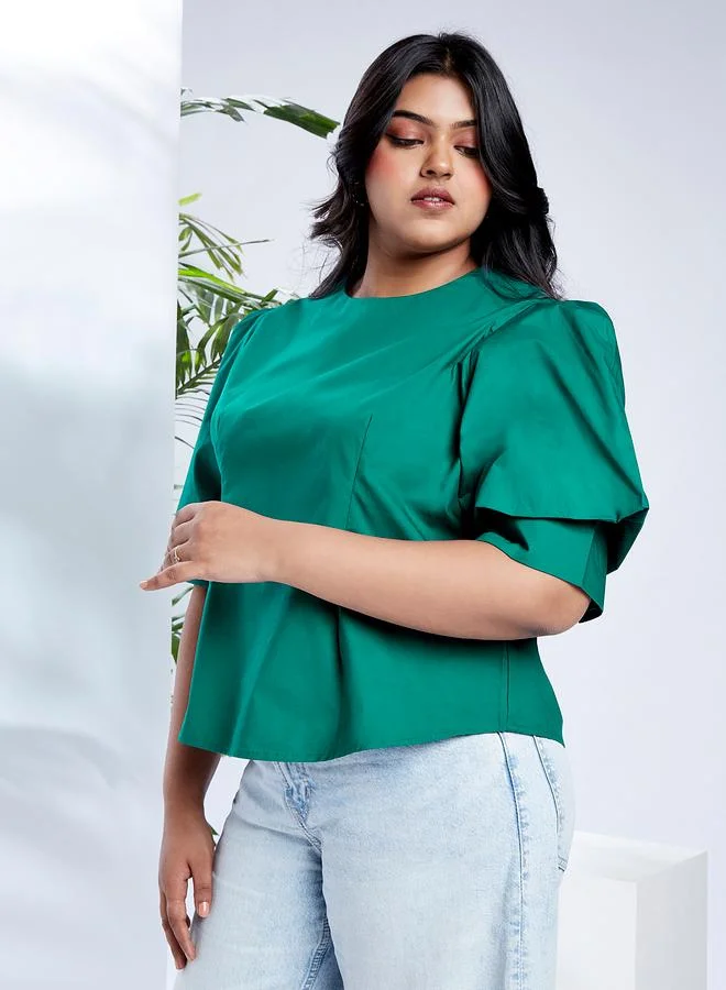 جلو باص بلوزة بمقاس كبير وأكمام منفوخة