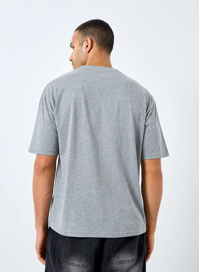 Styli Styli Front Graphic Crew Neck Oversized T-Shirt