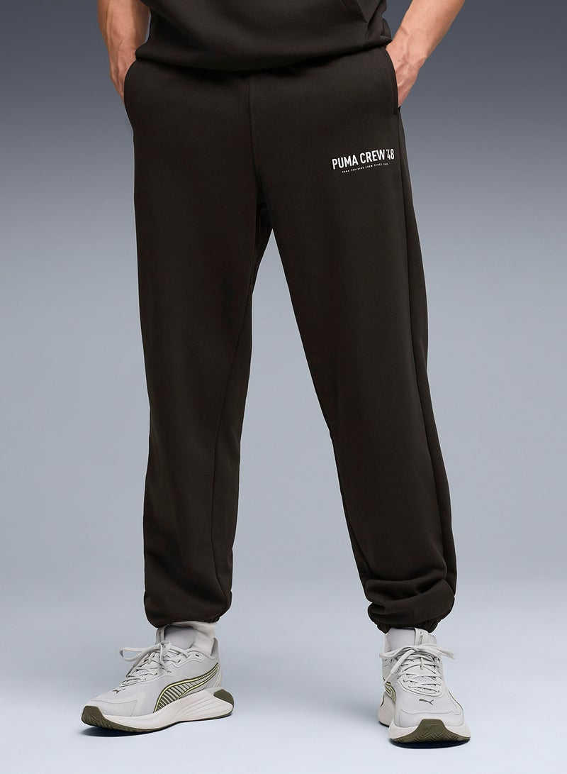 PUMA Graphics French Terry Jogger Pants - Image 1
