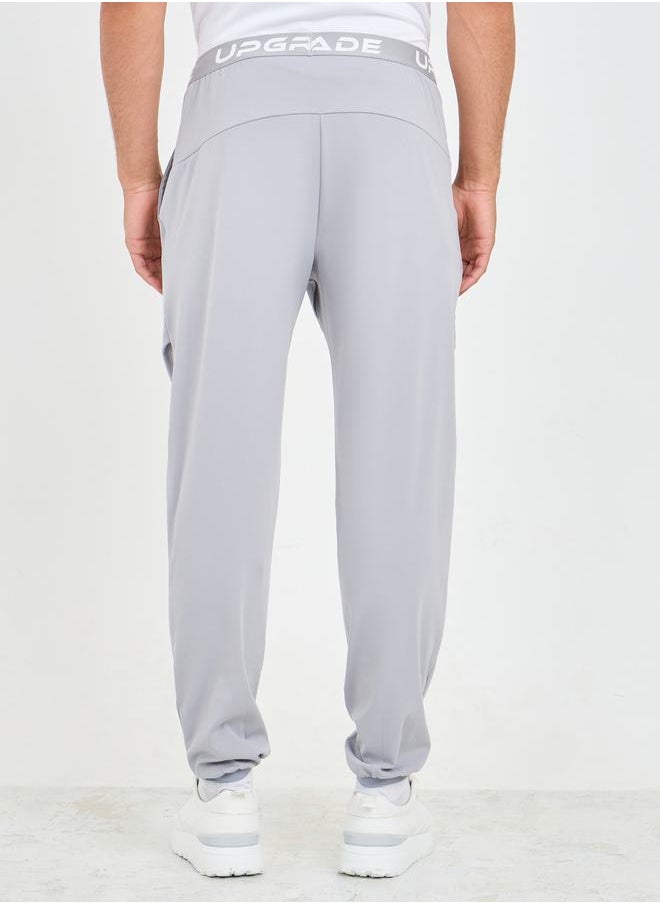 Styli - Slim Fit Running Trackpants with Printed Elasticated Waistband - Image 1
