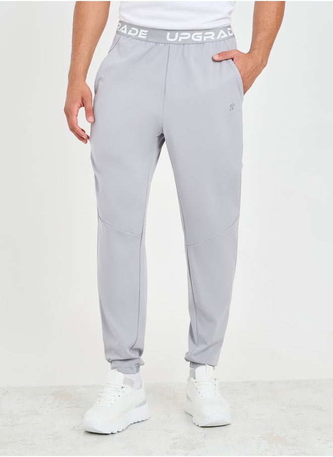 Styli - Slim Fit Running Trackpants with Printed Elasticated Waistband - Image 1