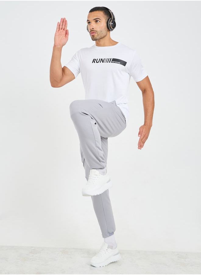 Styli - Slim Fit Running Trackpants with Printed Elasticated Waistband - Image 1
