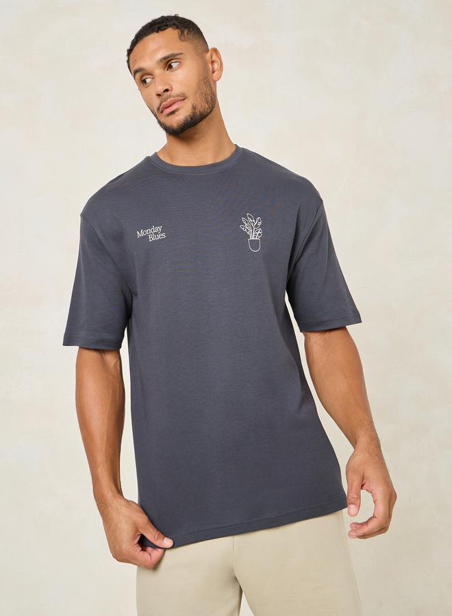 ستايلي تيشيرت أوفرسايز بطباعة جرافيك أمامية وخلفية - Image 3