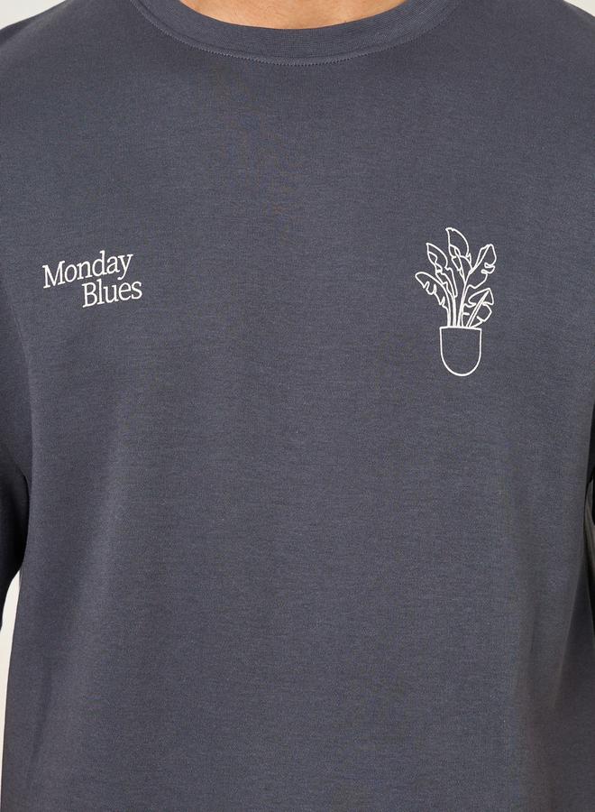 ستايلي تيشيرت أوفرسايز بطباعة جرافيك أمامية وخلفية - Image 4