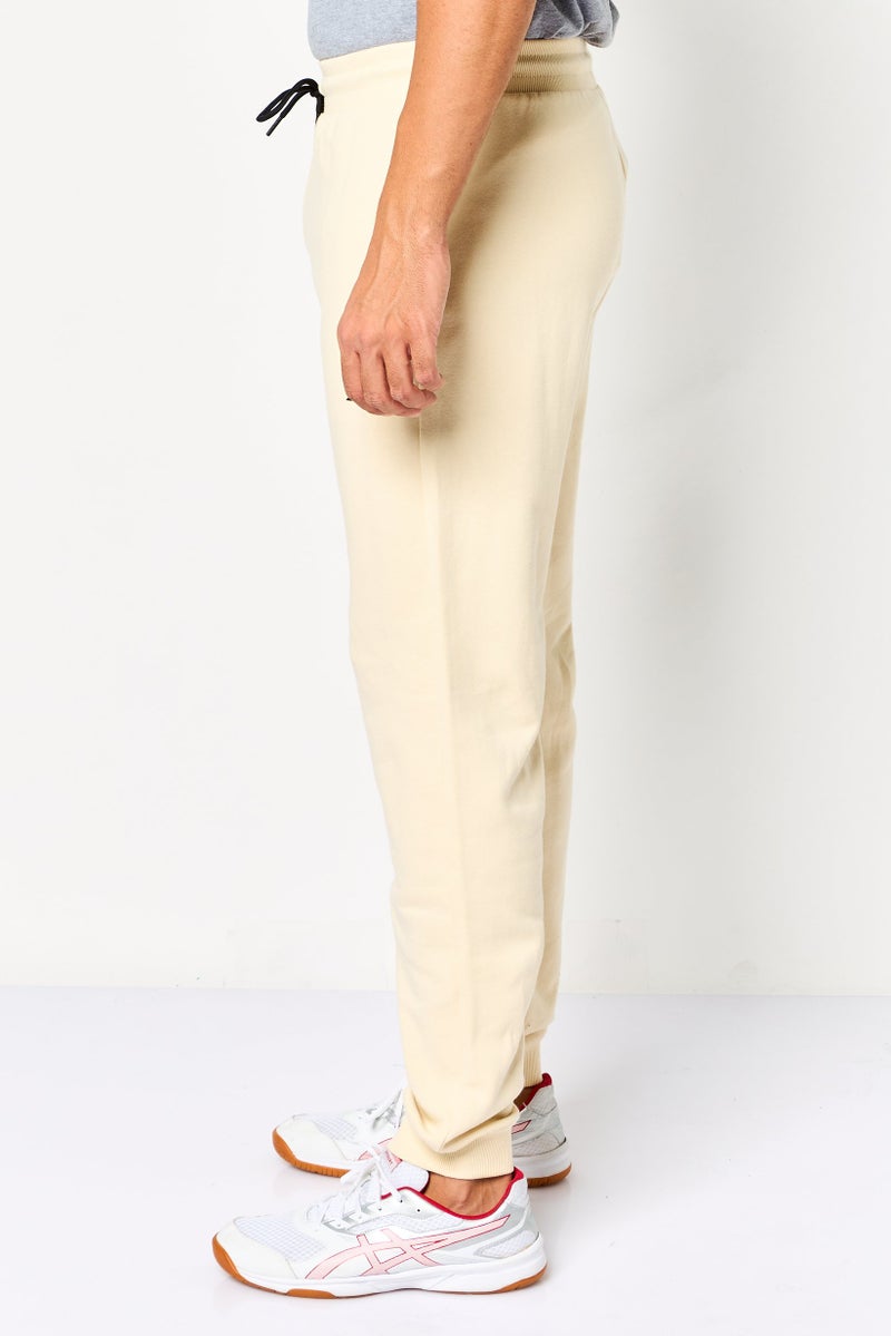 Reebok سروال رياضي للرجال مناسب في الهواء الطلق، بيج - Image 3