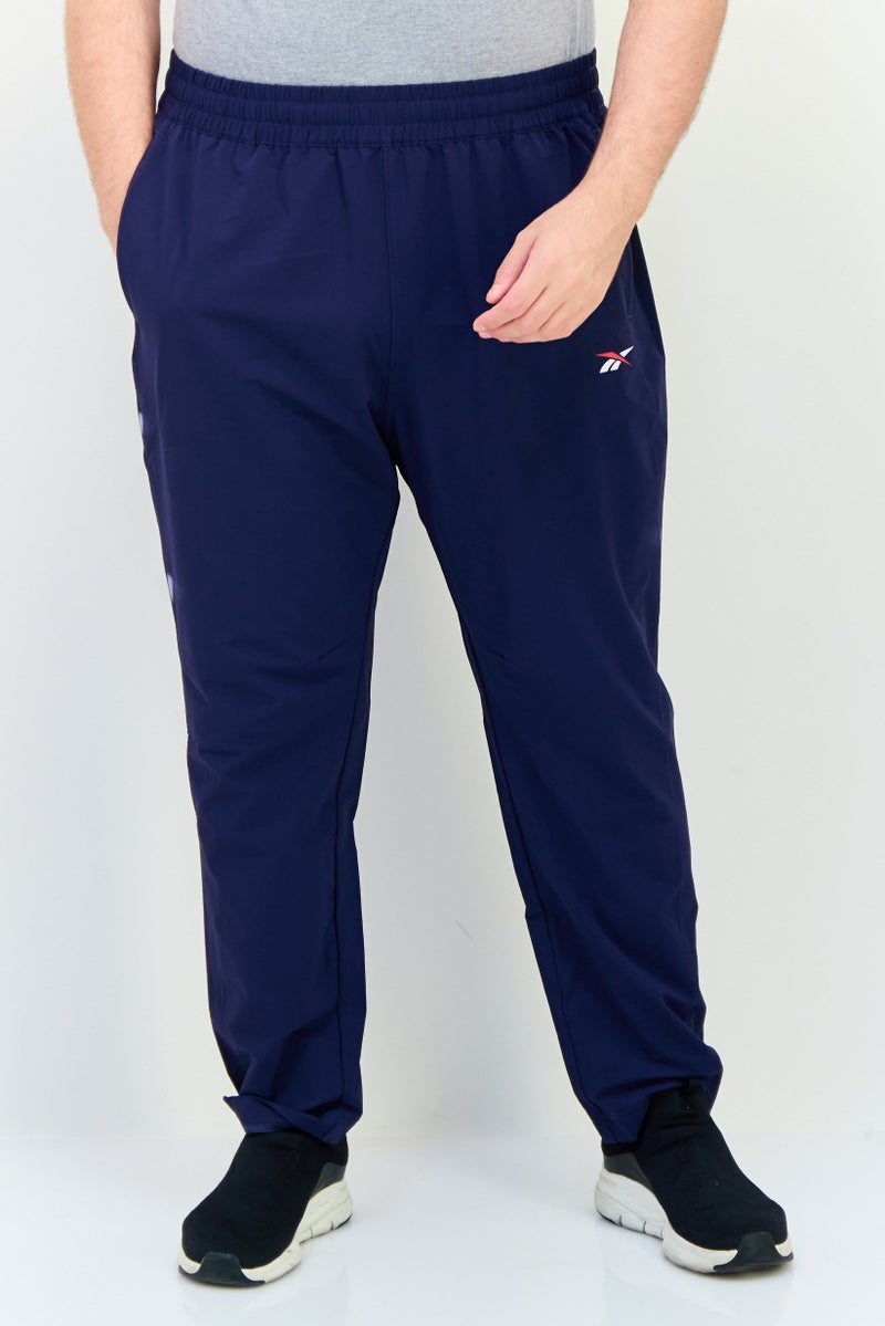 Reebok سروال رياضي للرجال مناسب للتدريب، أزرق داكن - Image 1