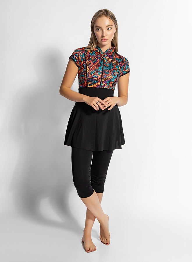 منيرفا سيكرت مايستيك إنديا - طقم سباحة نسائي من قطعة واحدة بتنورة وسروال - Image 1