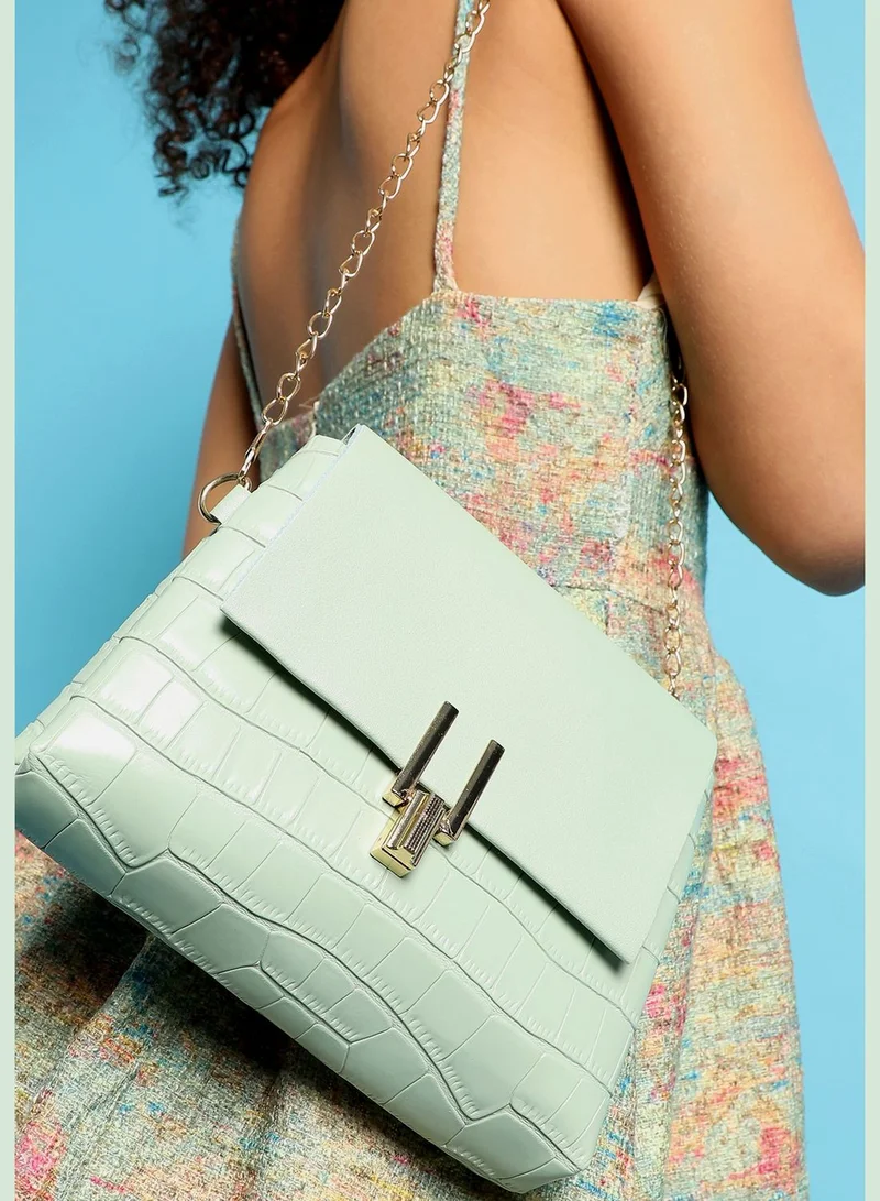 Haute Sauce Textured Casual Regular Sling Bag with Push Lock For Women