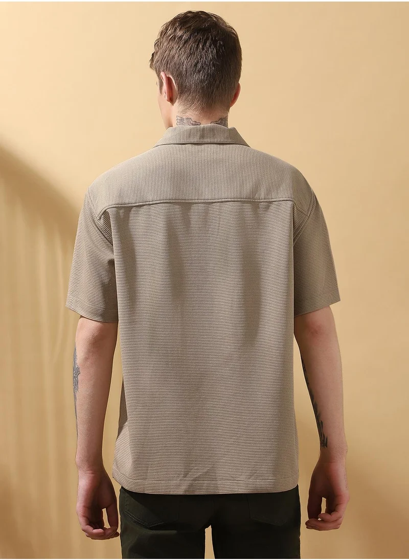 دينيس لينغو Beige Relaxed fit Shirts Textured design crafted from 100% Polyester featuring Half Sleeve with Button closure.