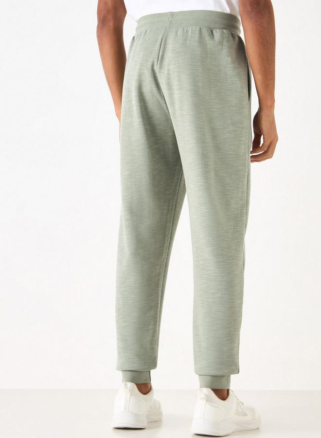 كابا بنطلون رياضي بتطريز شعار ورباط إغلاق وجيوب من كابا - Image 3