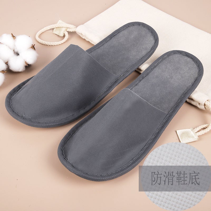 Wholesale five-star hotel homestay beauty salon thick-soled slippers disposable home hospitality thickened hotel special Ash non-woven fabric (anti-slip bottom) 800/piece 