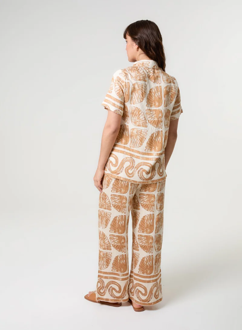 بلو فانيلا طقم بلوزة وبنطلون بتصميم صدف