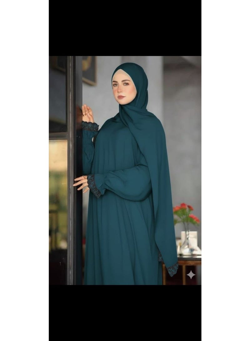 Elegant one-piece prayer sheet with attached veil and soft lace detailing on the sleeves.
