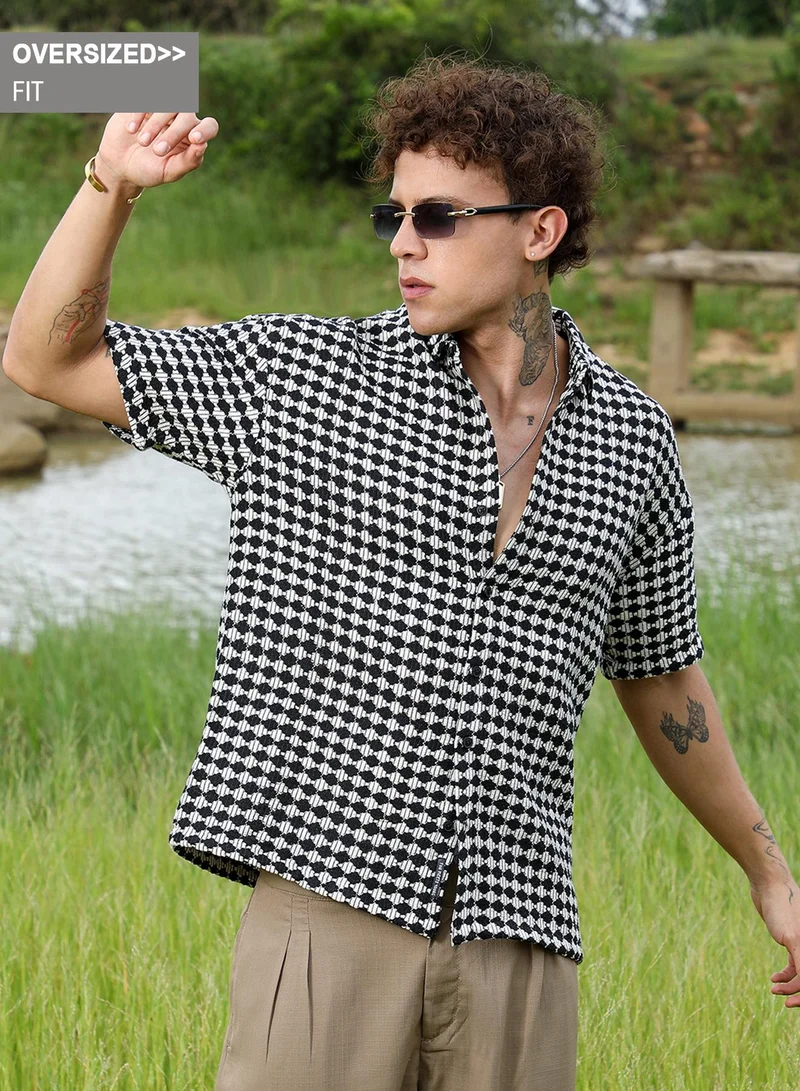 Campus Sutra Campus Sutra Men's Midnight Black & Powder White Lozenge-Striped Oversized Shirt For Casual Wear | Cuban Collar | Short Sleeve | Button Closure | Oversized Shirt Crafted With Comfort Fit For Everyday Wear